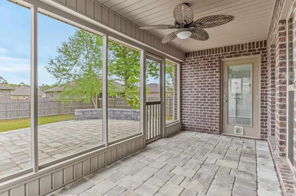 a view of empty room with windows