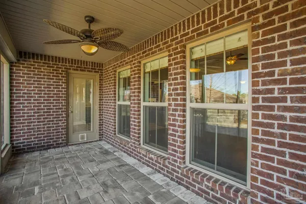 a front view of a house with swimming pool