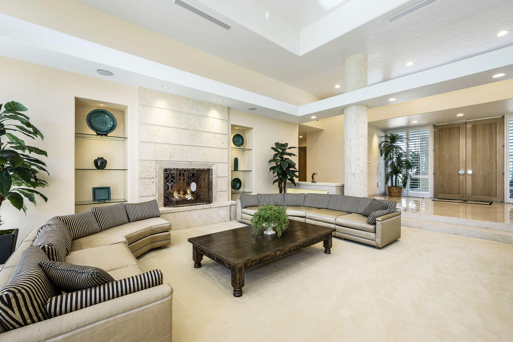 55305 Pebble Beach La Quinta, CA 92253 - Photo 11 of 65 a living room with furniture and a fireplace
