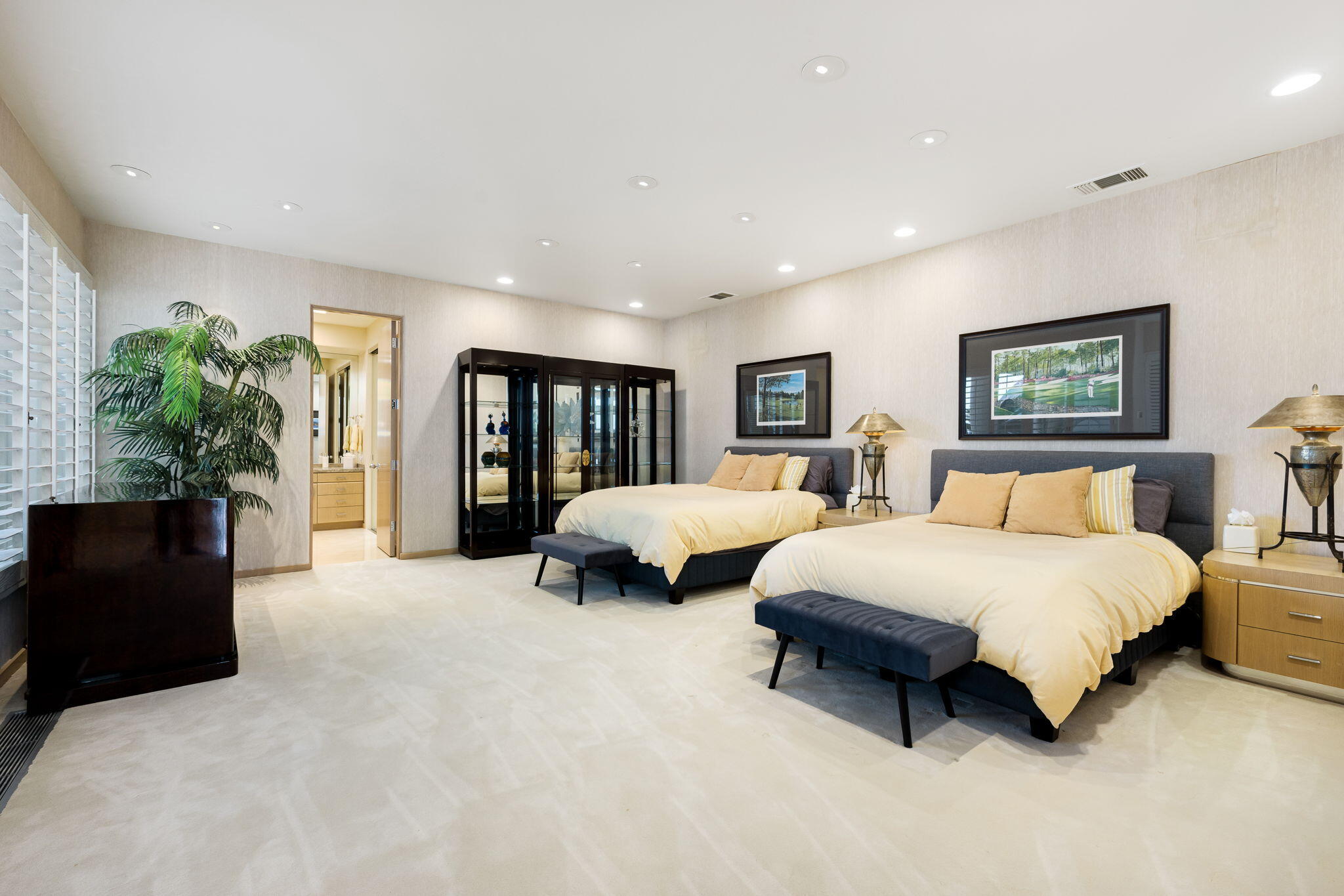 55305 Pebble Beach La Quinta, CA 92253 - Photo 35 of 65 a spacious bedroom with a bed and a couch