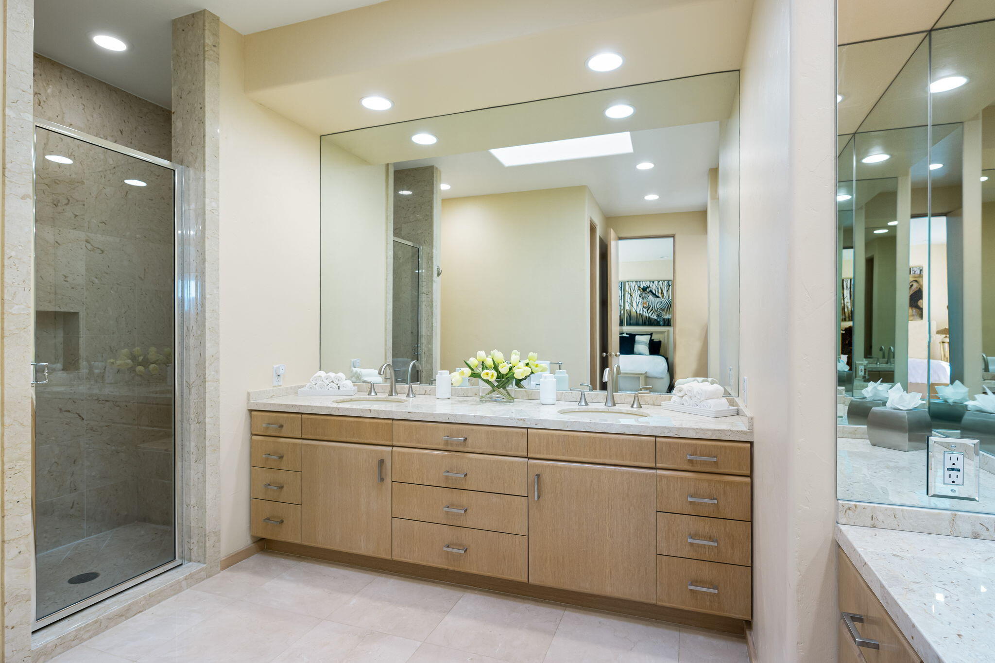 55305 Pebble Beach La Quinta, CA 92253 - Photo 39 of 65 a bathroom with a double vanity sink mirror and shower