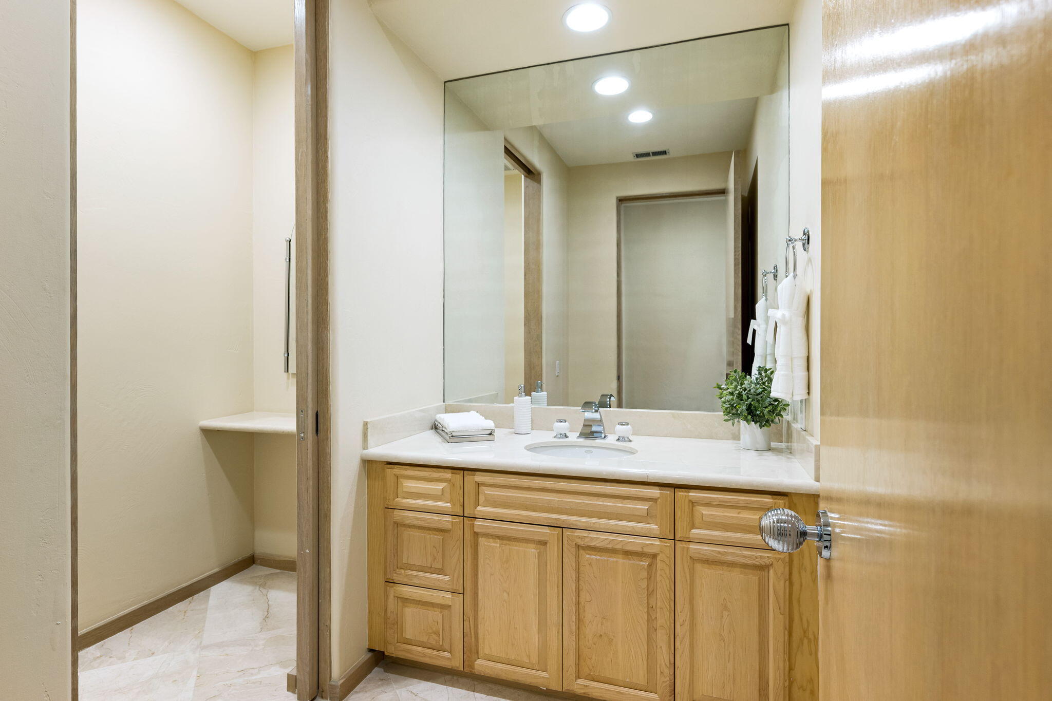 55305 Pebble Beach La Quinta, CA 92253 - Photo 40 of 65 a bathroom with a granite countertop sink mirror and double