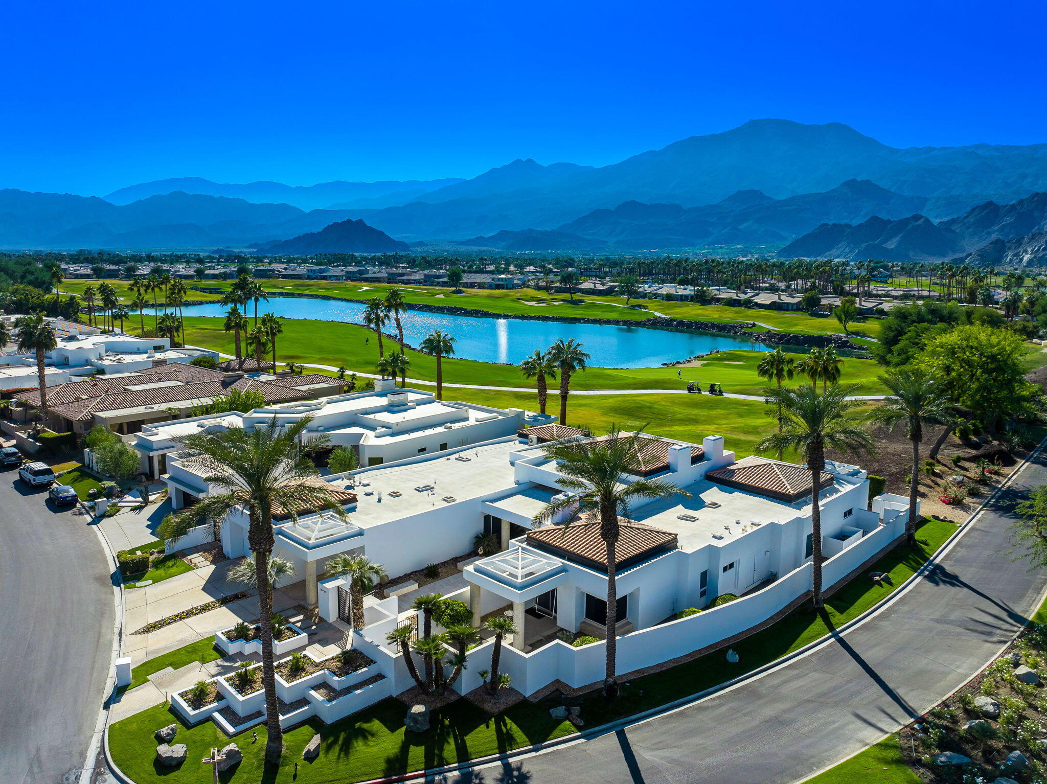 55305 Pebble Beach La Quinta, CA 92253 - Photo 64 of 65 a view of a patio with furniture and a garden