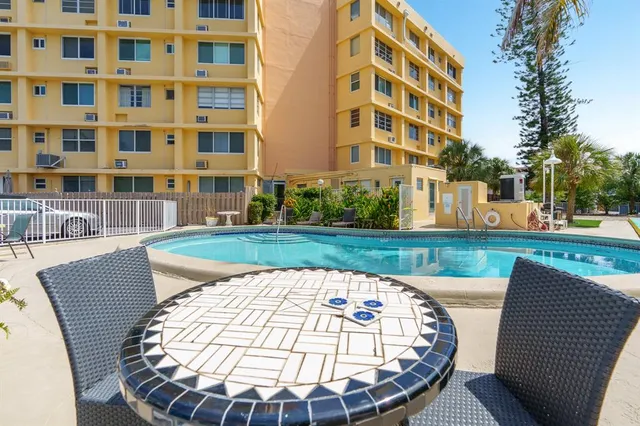 front view of building with a yard