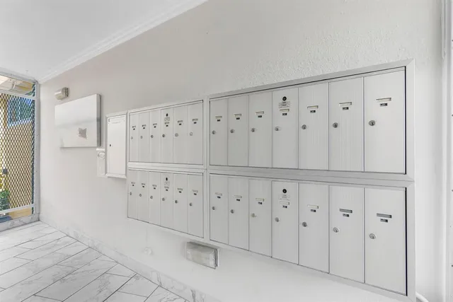 a view of a bathroom from a hallway