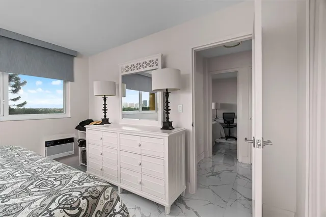 a kitchen with stainless steel appliances a refrigerator and cabinets