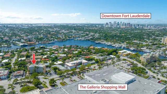 an aerial view of city and lake view