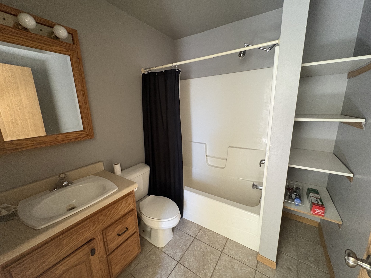 221 North 9th Street Rochelle, IL 61068 - Photo 14 of 17 a bathroom with a sink toilet and shower