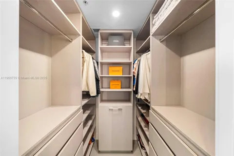 a bathroom with a shower and toilet