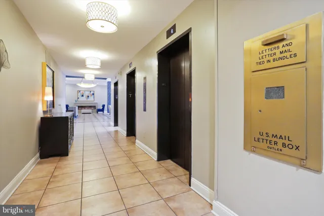a view of a entryway door with hallway