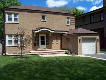 180 Olmsted Road Riverside, IL 60546 - Photo 1 of 1 a front view of a house with a yard