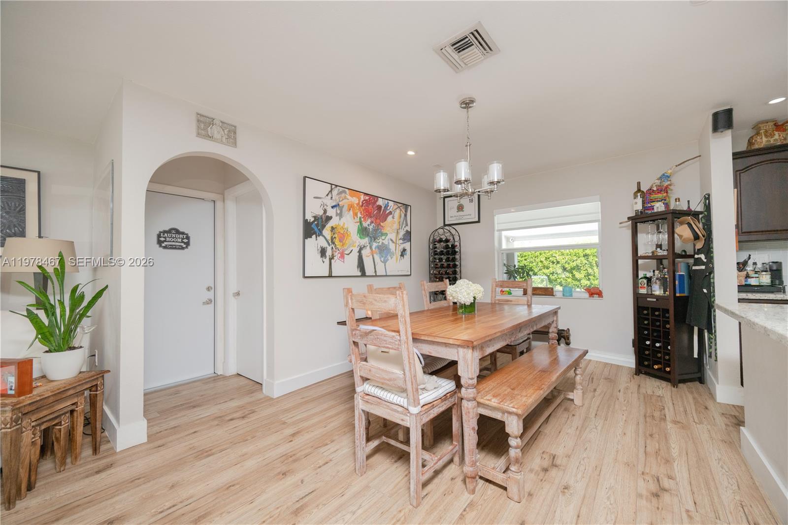 19431 Franjo Road Cutler Bay, FL 33157 - Photo 11 of 32 a view of a dining room with furniture and wooden floor