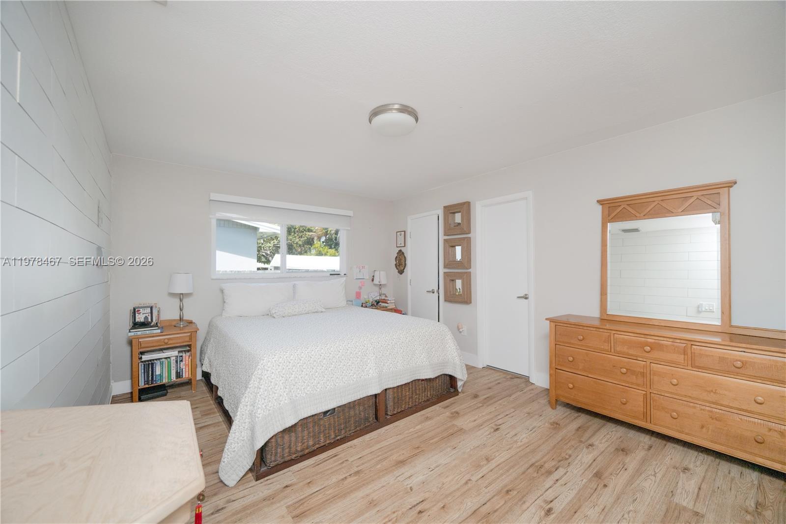 19431 Franjo Road Cutler Bay, FL 33157 - Photo 15 of 32 a bedroom with a bed and window