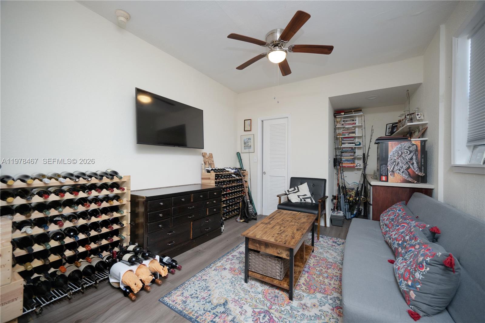 19431 Franjo Road Cutler Bay, FL 33157 - Photo 18 of 32 a bedroom with furniture and a flat screen tv