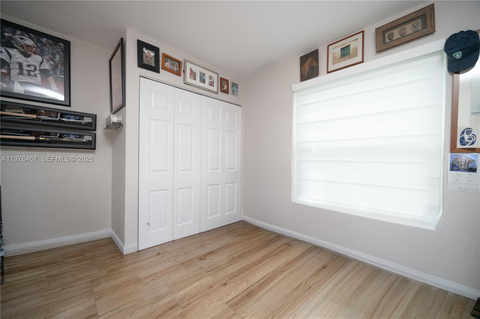 19431 Franjo Road Cutler Bay, FL 33157 - Photo 26 of 32 a view of a kitchen with wooden floor and window
