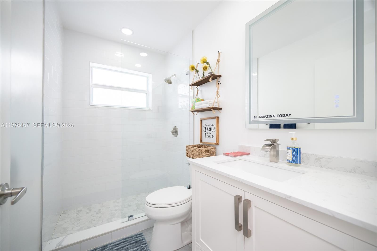 19431 Franjo Road Cutler Bay, FL 33157 - Photo 30 of 32 a bathroom with a sink a toilet and shower