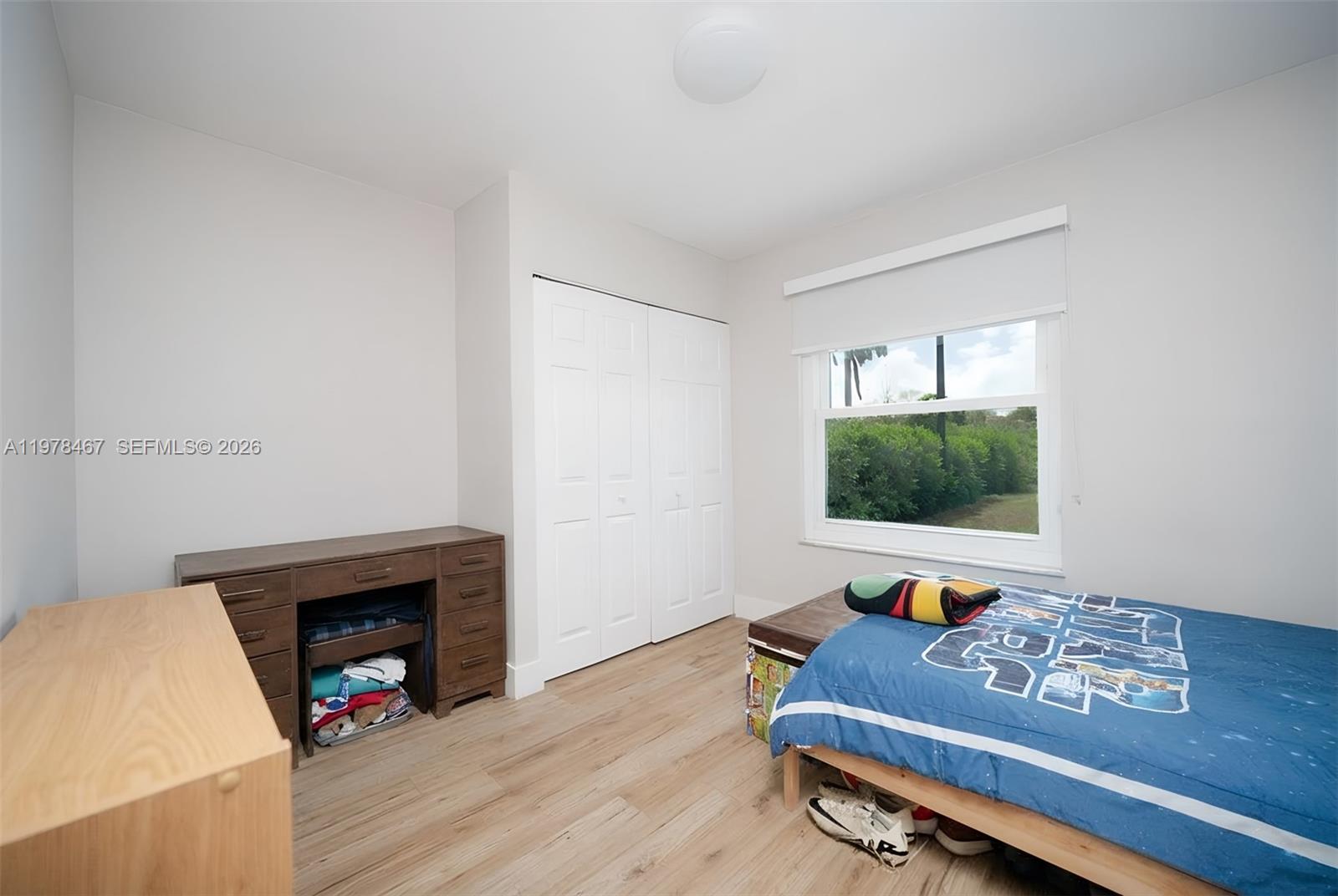 19431 Franjo Road Cutler Bay, FL 33157 - Photo 32 of 32 a living room with furniture and a fireplace