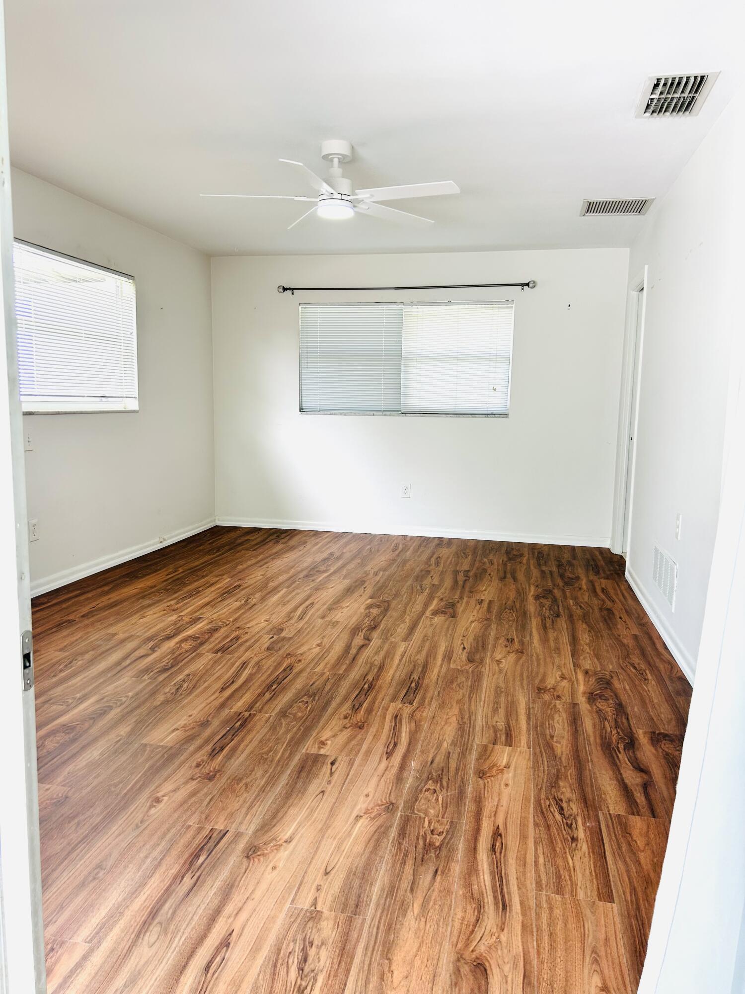 162 Beacon Lane Jupiter Inlet Colony, FL 33469 - Photo 11 of 16 wooden floor in a room