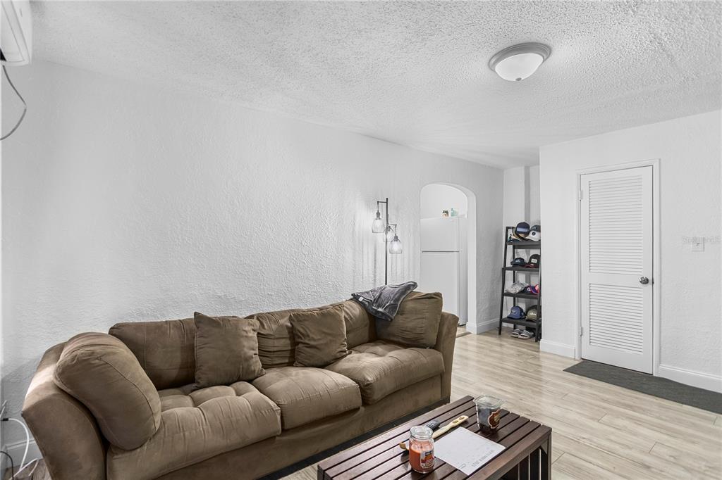 4762 Haines Road North St. Petersburg, FL 33714 - Photo 17 of 29 a living room with furniture and wooden floor