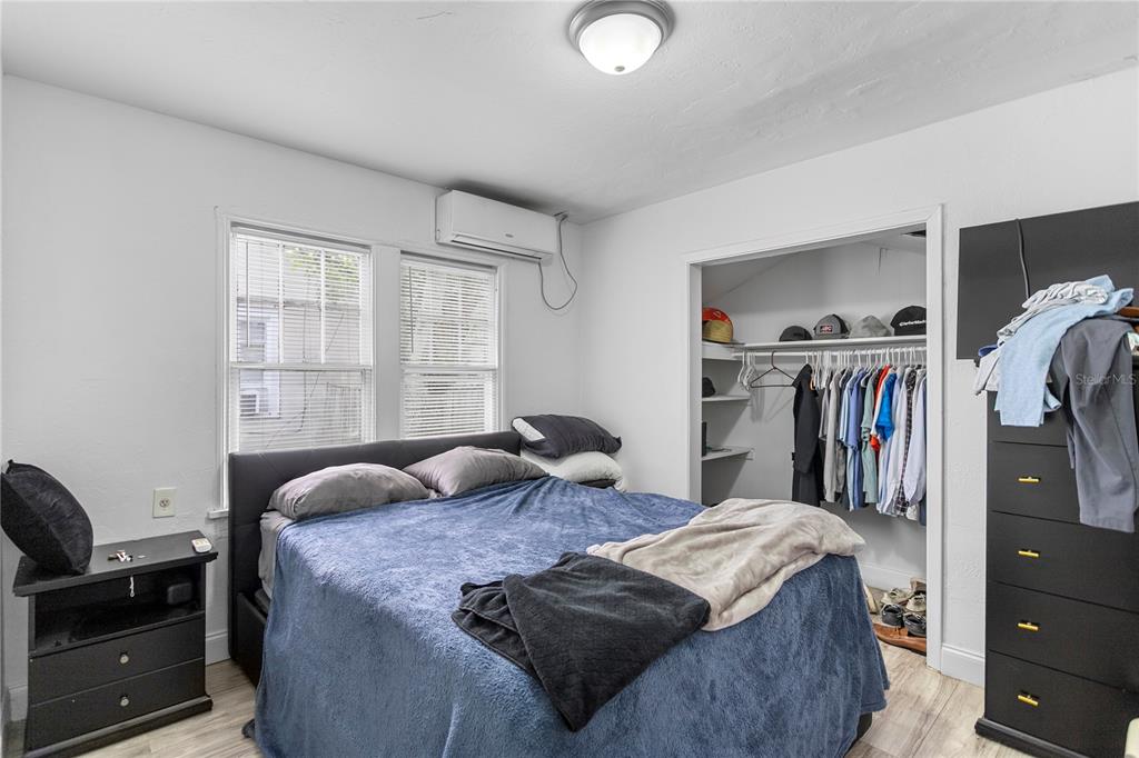 4762 Haines Road North St. Petersburg, FL 33714 - Photo 21 of 29 a bedroom with a bed and a window