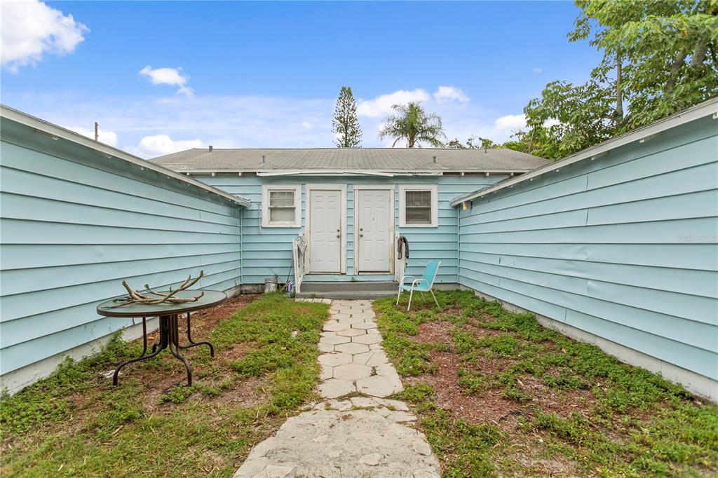 4762 Haines Road North St. Petersburg, FL 33714 - Photo 24 of 29 a view of a backyard with a sitting area