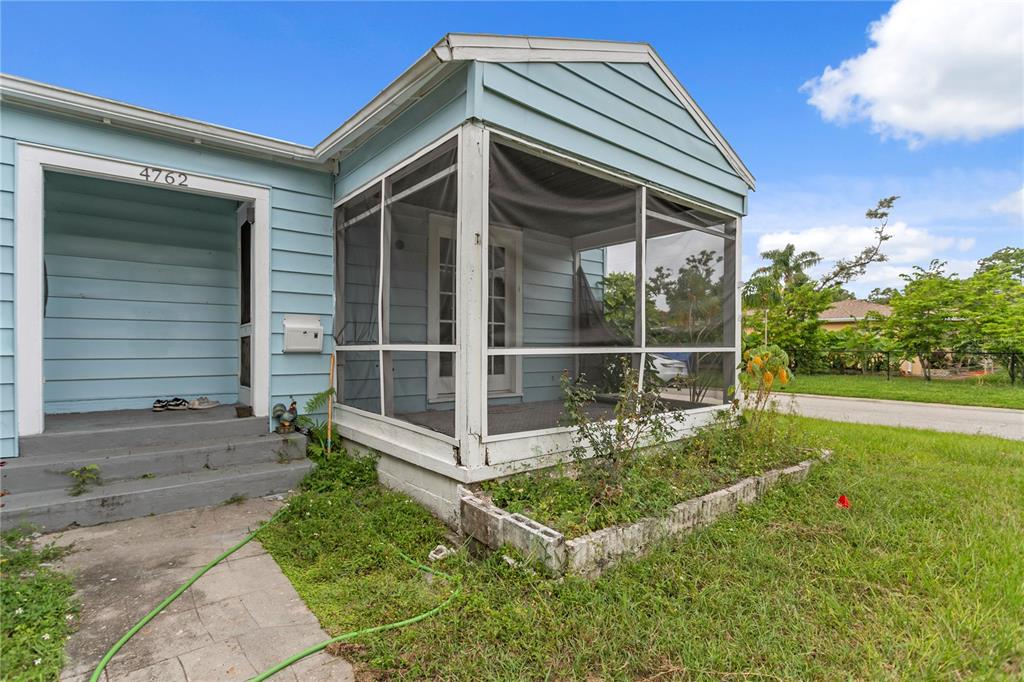 4762 Haines Road North St. Petersburg, FL 33714 - Photo 4 of 29 a view of backyard with a garden and plants