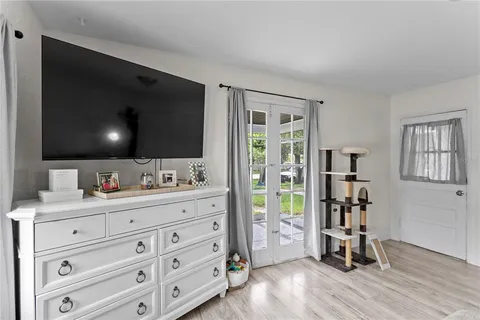 a bathroom with a sink a vanity and a mirror