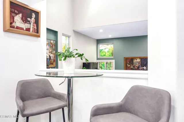 a kitchen with granite countertop a stove and a sink