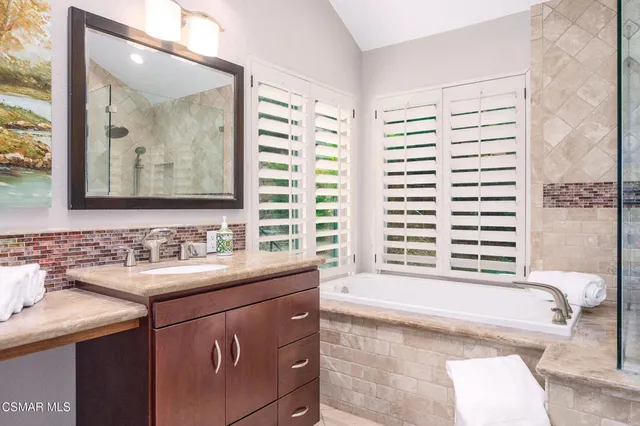 a garden view with a seating space