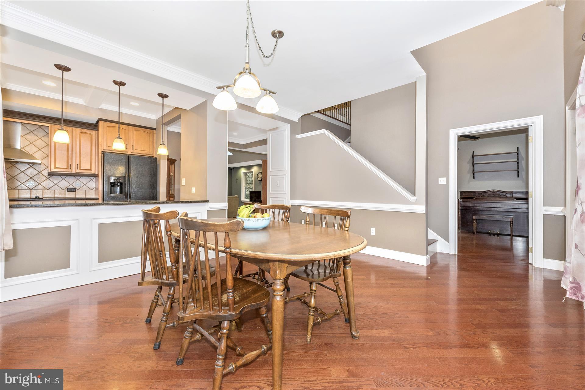 Dining Room opens to Kitchen & Ofc.