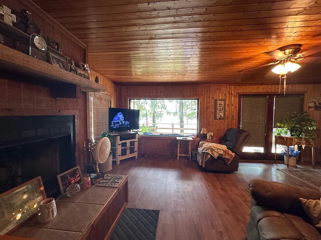 229 County Road Jefferson, TX 75657 - Photo 15 of 40 a living room with furniture and a fireplace