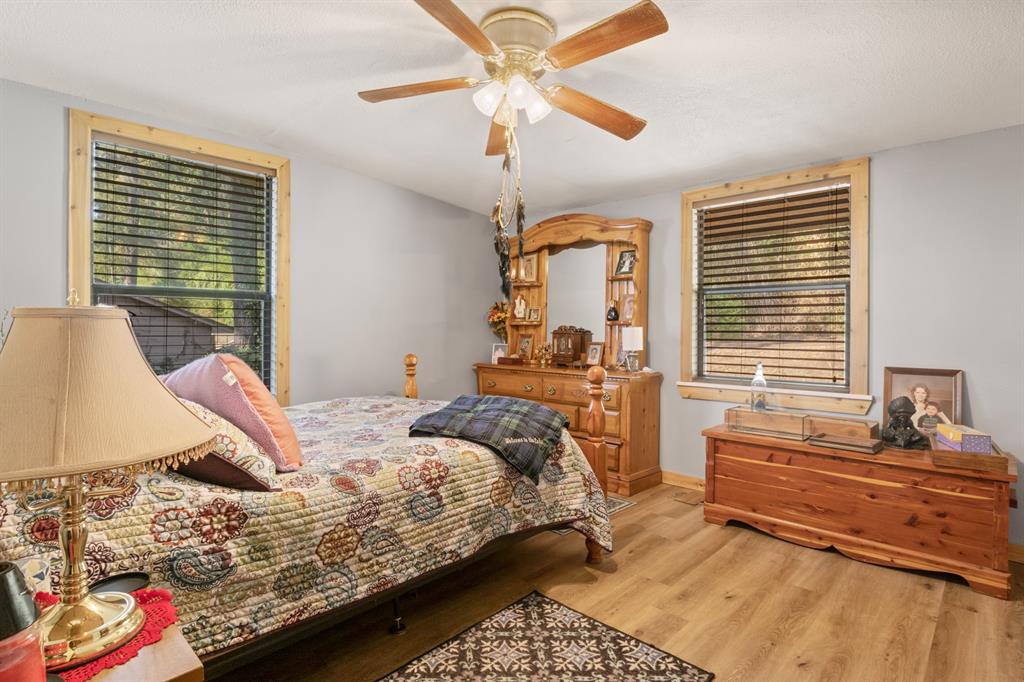 229 County Road Jefferson, TX 75657 - Photo 23 of 40 a bedroom with a bed and window