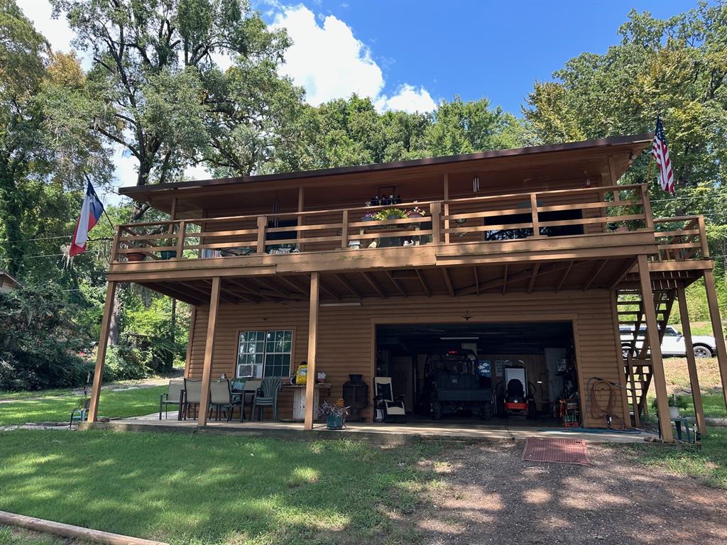 229 County Road Jefferson, TX 75657 - Photo 29 of 40 a view of a house with a yard