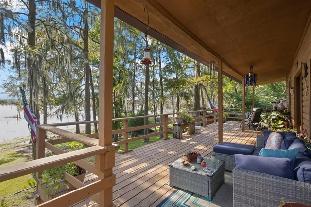 a outdoor living space with patio furniture and a potted plants