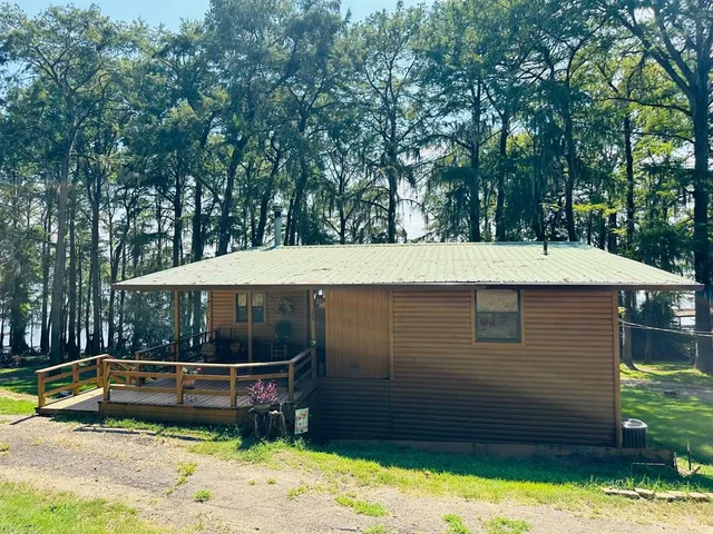 a view of a backyard with a small pool