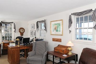 138 Stage Island Road Chatham, MA 02633 - Photo 11 of 19 a living room with furniture a window and a potted plant