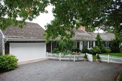 138 Stage Island Road Chatham, MA 02633 - Photo 2 of 19 a house view with a garden space