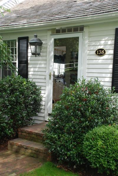 138 Stage Island Road Chatham, MA 02633 - Photo 4 of 19 a front view of a house with plants