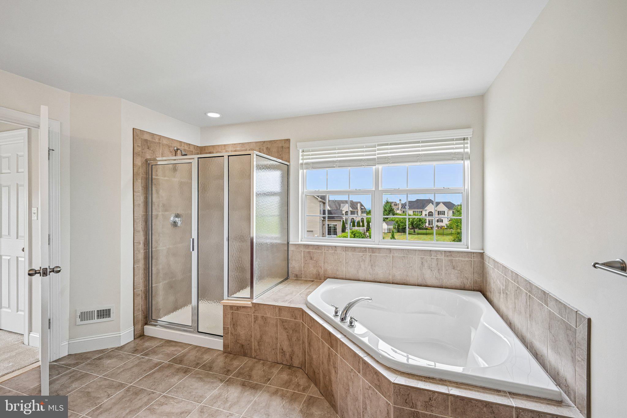 440 Elizabeth Way Hatfield, PA 19440 - Photo 32 of 60 Serene bathroom with scenic views.