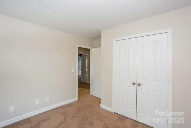 a view of a room with an empty space