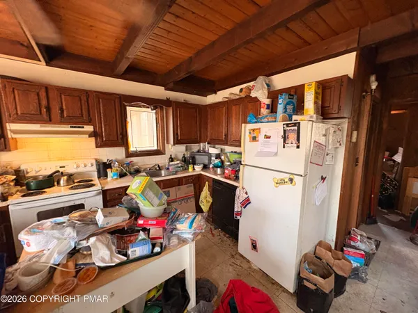 a storage room with washer and dryer