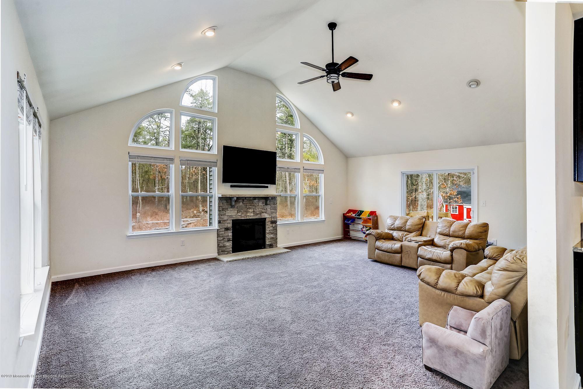 20 Pasadena Road Whiting, NJ 08759 - Photo 20 of 60 a living room with furniture and a flat screen tv