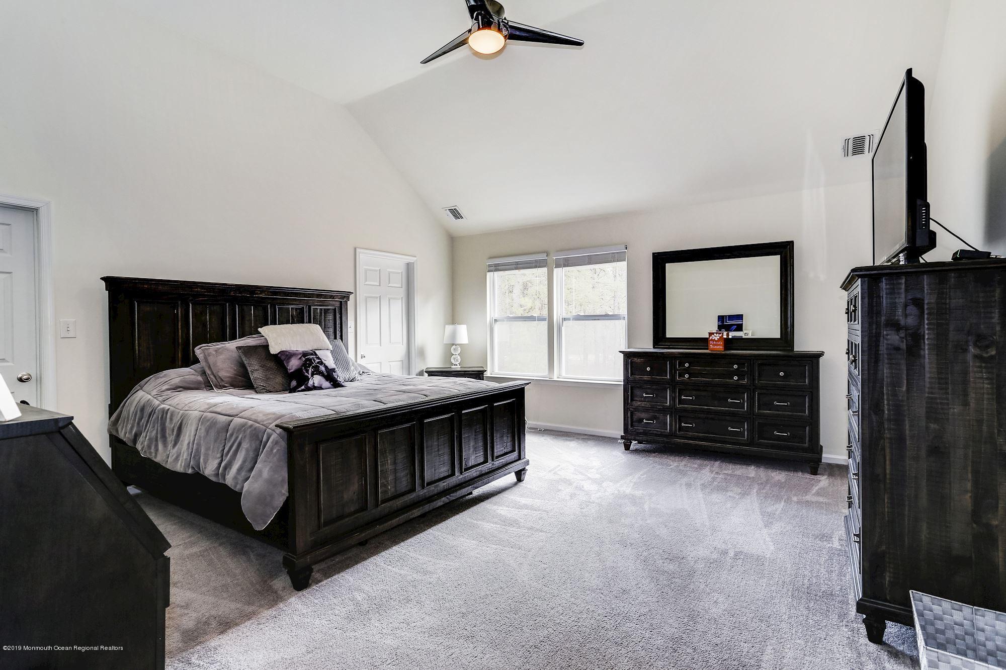 20 Pasadena Road Whiting, NJ 08759 - Photo 32 of 60 a bed room with a bed window and a television