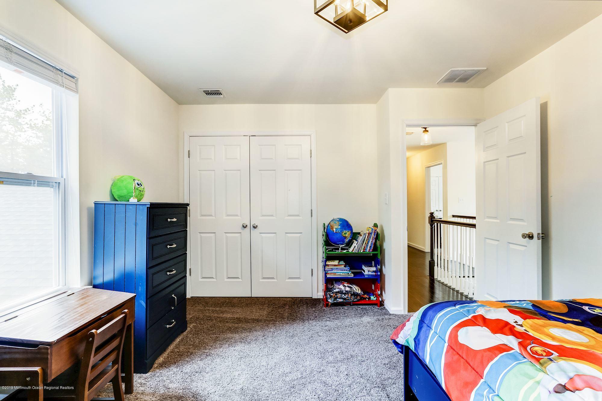 20 Pasadena Road Whiting, NJ 08759 - Photo 42 of 60 a bedroom with bed and a window
