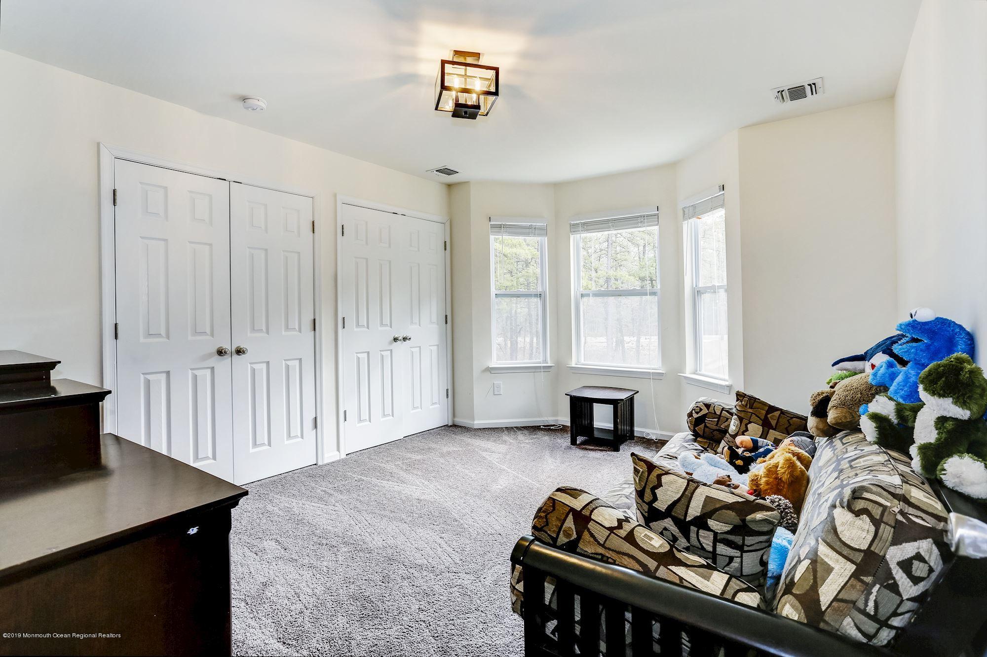 20 Pasadena Road Whiting, NJ 08759 - Photo 46 of 60 a living room with furniture and a window