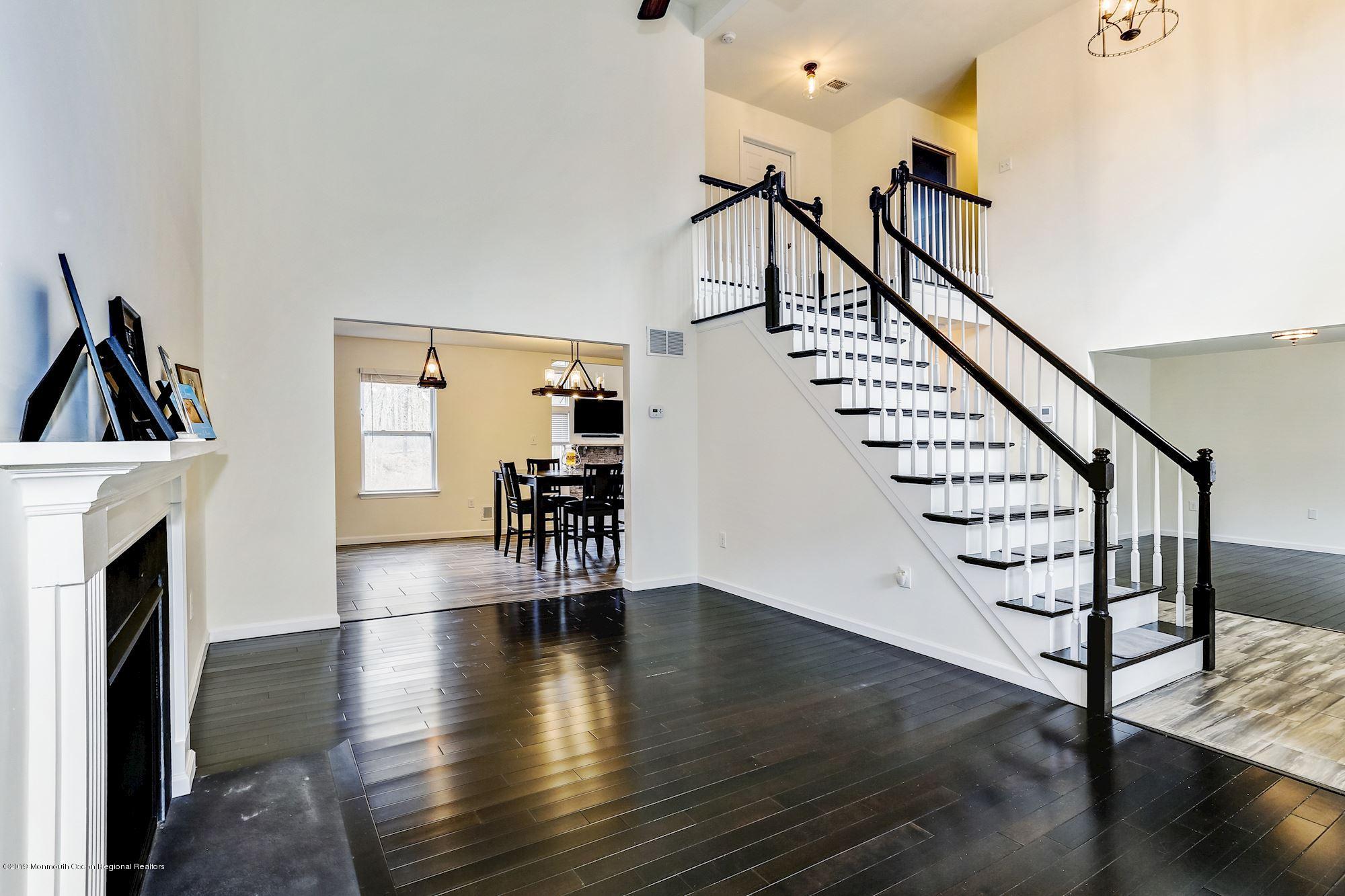 20 Pasadena Road Whiting, NJ 08759 - Photo 6 of 60 a view of entryway and hall with wooden floor