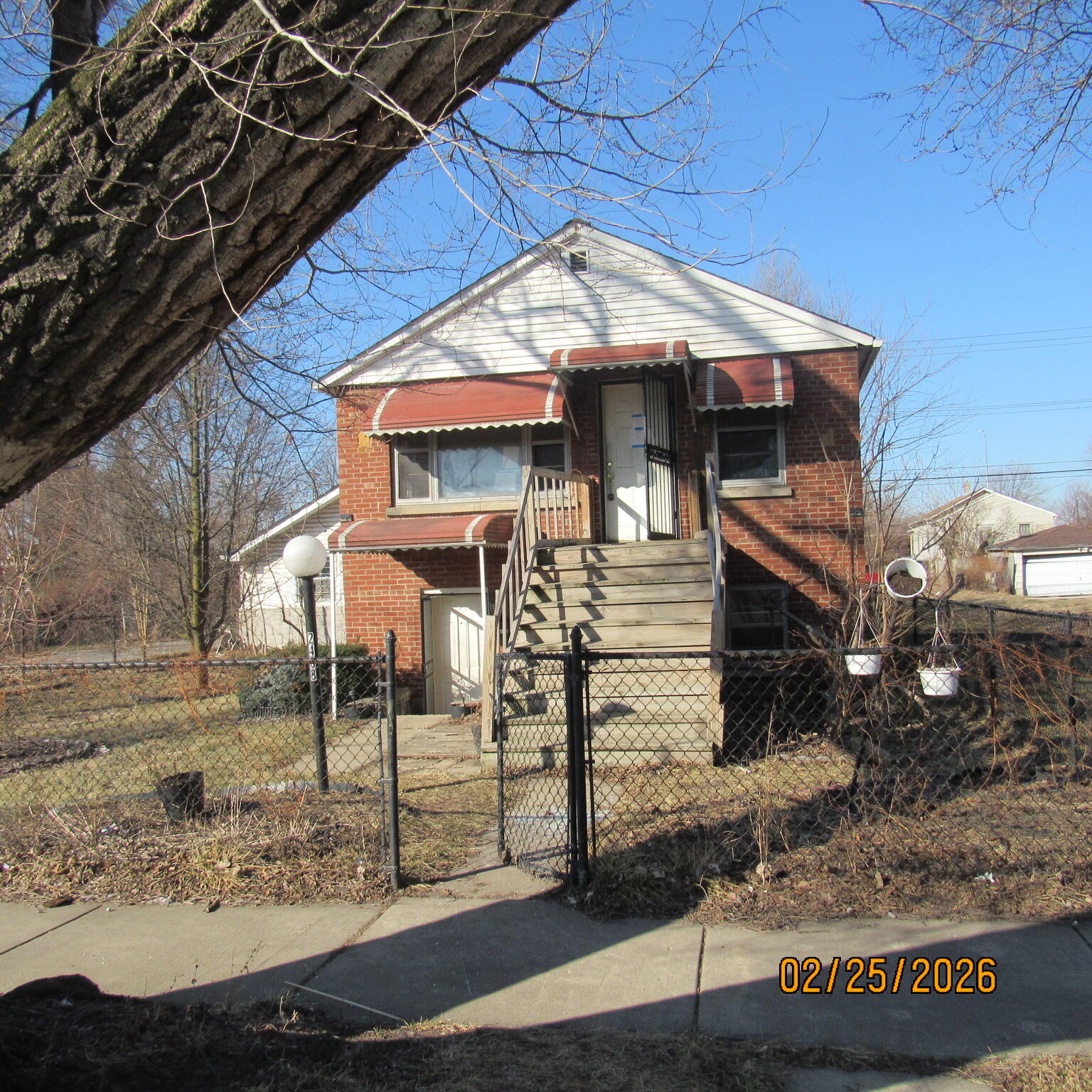 2468 Johnson Street Gary, IN 46407 - Photo 1 of 21 a front view of a house