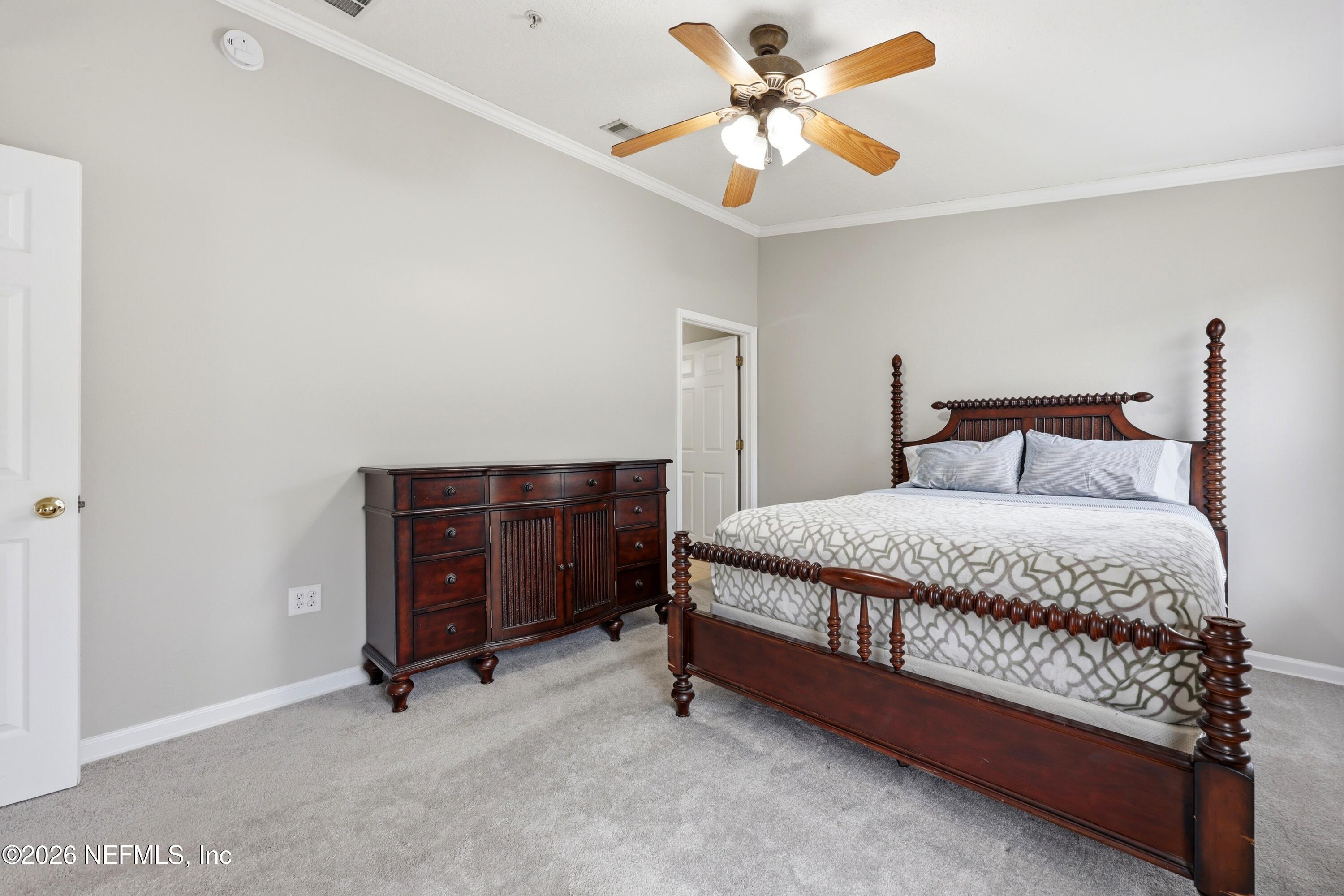 7920 Merrill Road, Unit 411 Jacksonville, FL 32277 - Photo 4 of 36 Primary Bedroom
