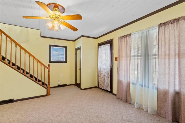 a view of a hallway with a chandelier
