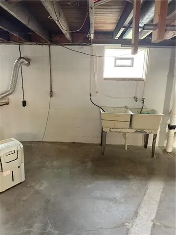 a room with table and chairs